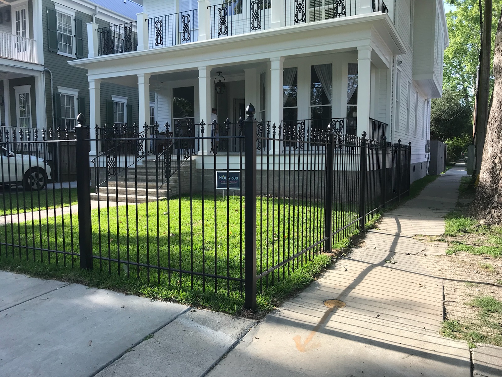 Wrought iron fence in a residential yard